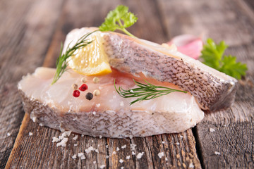 raw fish on wooden background