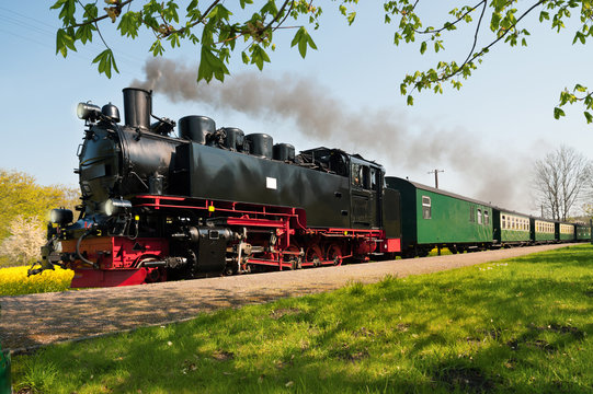 Fototapeta Historical German steam train in spring