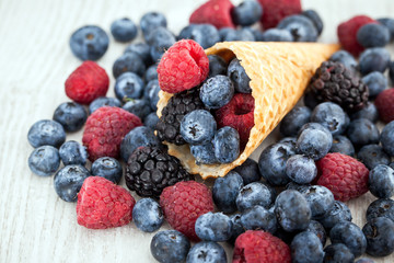Fresh berries in waffle cone
