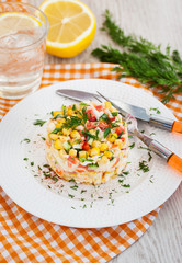 Fresh vegetable and crab salad with mayonnaise