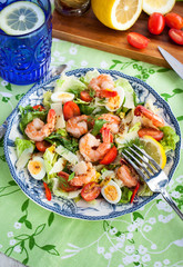 Fresh shrimps, eggs and vegetables salad