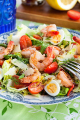 Fresh shrimps, eggs and vegetables salad