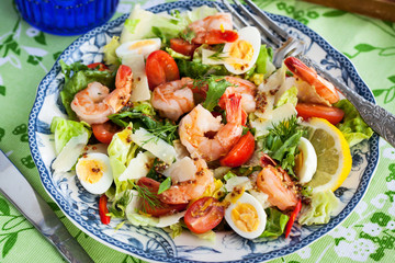 Fresh shrimps, eggs and vegetables salad