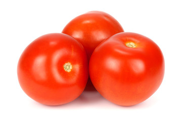 three fresh tomatoes