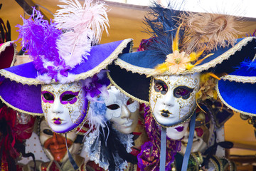 Venetian masks in store display in Venice.