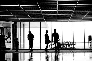 people silhouettes at airport