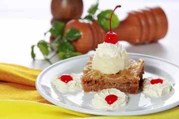Fototapeta na wymiar Greek dessert Baklava served with vanilla ice cream