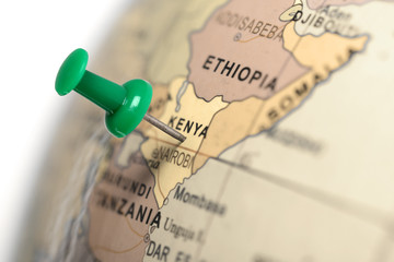 Naklejka premium Lokalizacja Kenia. Zielona pinezka na mapie.