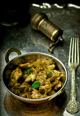fried chicken fillet in the Indian copper bowl