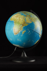 Earth globe isolated on the black background