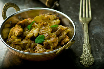 fried chicken fillet in the Indian copper bowl