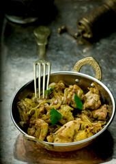 fried chicken fillet in the Indian copper bowl