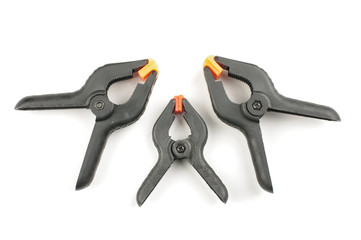 Three A spring clamps isolated
