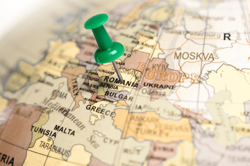 Fototapeta premium Location Romania. Green pin on the map.