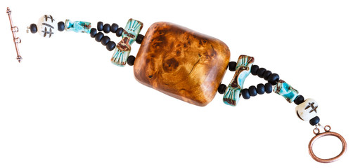 bracelet from wooden piece and stone beads © vvoe