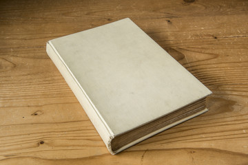 Fototapeta premium Old antique yellowed book with no title on it