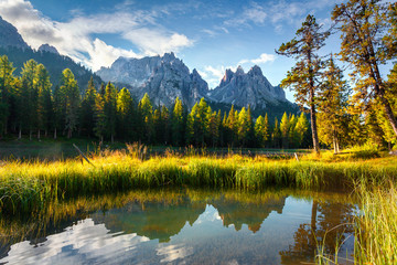 Colorful summer morning on the lake Antorno