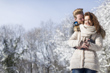 Fototapeta na wymiar Young couple at winter