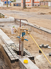 Ein Strandrohr für Bauwasser an einem Unterflurhydranten