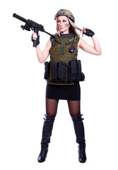 Woman in a military camouflage holding the smg