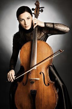 Cello player cellist playing