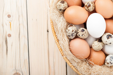 Mixed type eggs in the basket