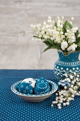 Obraz na płótnie Canvas Blue-white Easter decorations, space