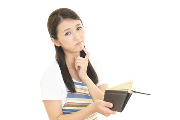 がっかりした表情の主婦