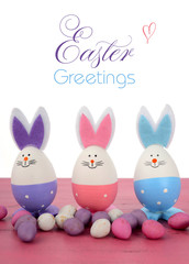 Pink, purple and blue Easter bunny eggs 