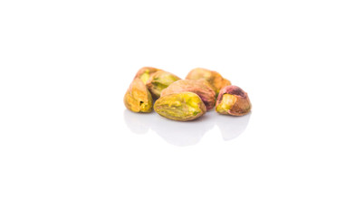 Pistachio nuts over white background