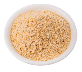 Whole grain breakfast cereal in a white bowl