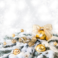 Golden Christmas decorations on abstract background, text space