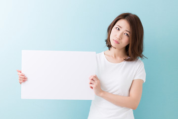 Obraz na płótnie Canvas ホワイトボードを持つ女性