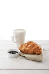 fresh baked croissant with coffee