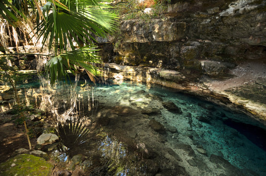 X-Batun Cenote - natural lagoon with transparent turquoise wate