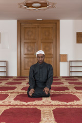 African Muslim Praying In Mosque