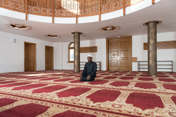 African Muslim Man Is Praying In The Mosque