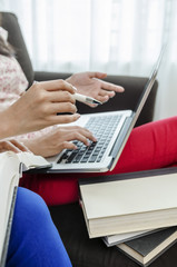 Two students discussing on PC