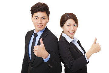 happy businessman and businesswoman with thumbs up