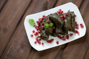 Grape leaves stuffed with rice and meat, high angle view