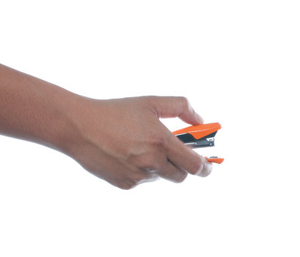 hand holding stapler