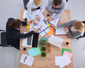 Group of business people working together in office
