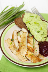 white meat and cranberry sauce