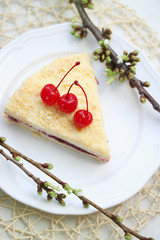Napoleon cake with cherries, top view