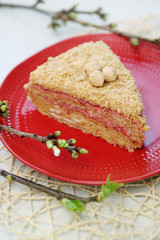 Honey cake with strawberry jam