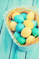 blue basket of eggs, tinted
