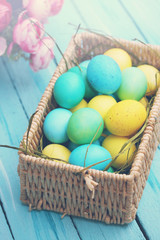 large basket of eggs, tinted