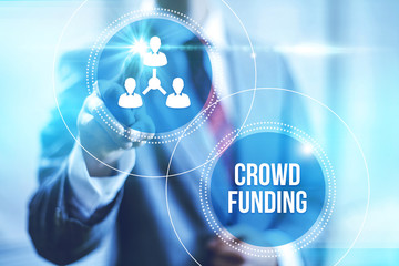 Businessman pointing crowdfunding , virtual interface