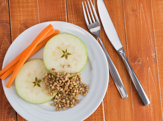 Apple, carrot and wheat sprouts