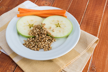 Apple, carrot and wheat sprouts
